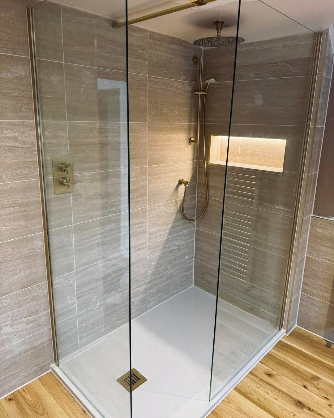 Recent walk-in shower installation by Plumbing by Dan